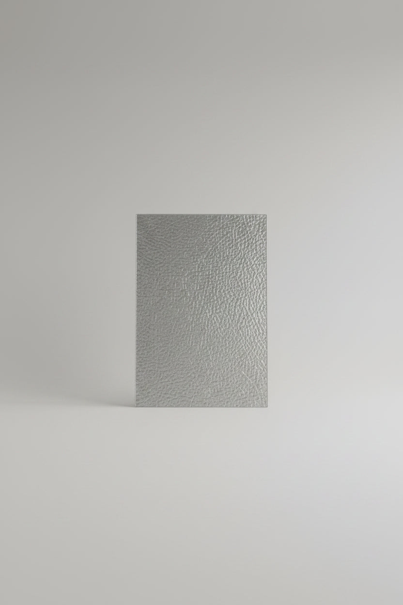 A textured clear embossed sheet with a crinkled, hammered surface' use in roofing.